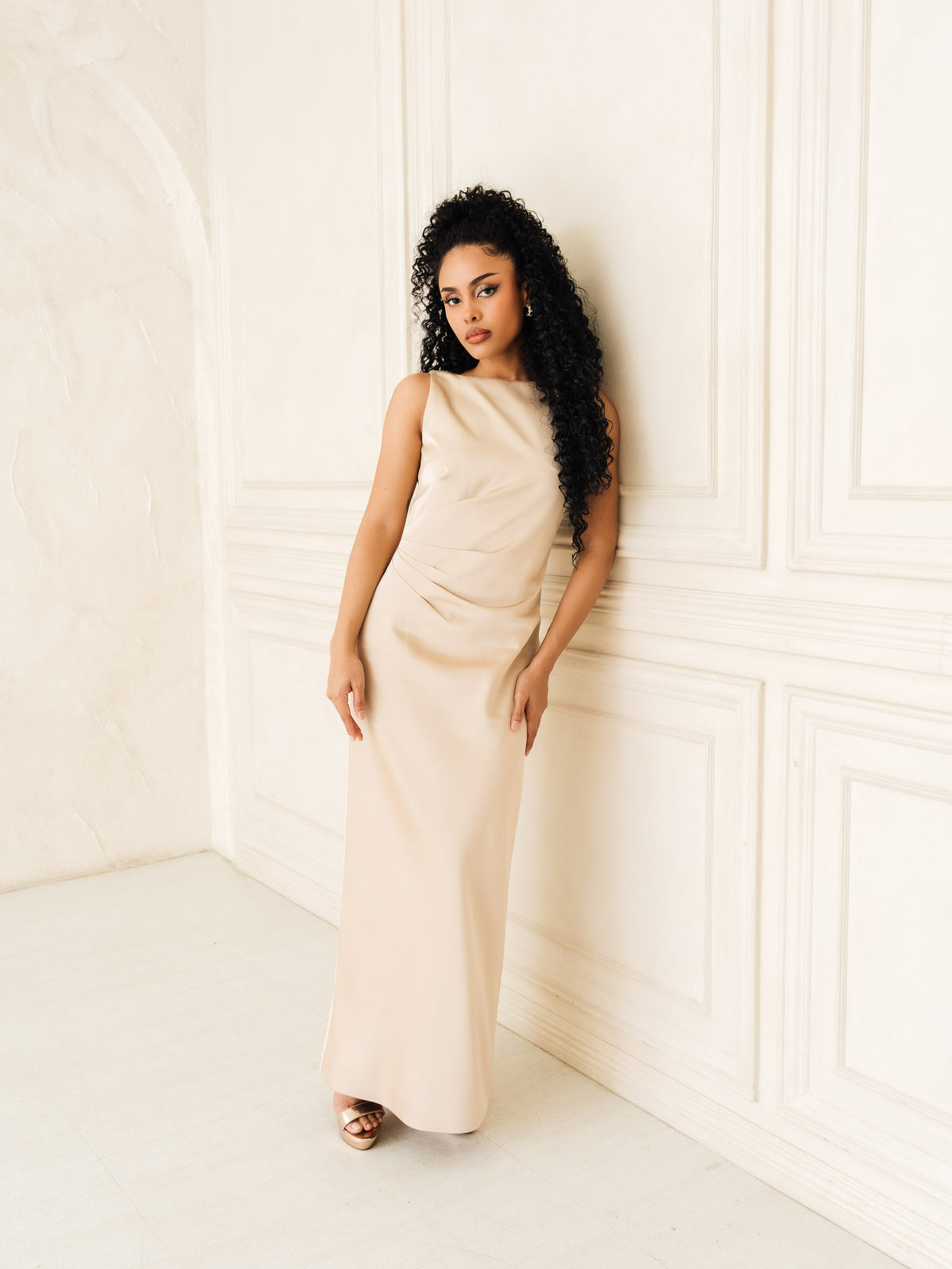 Fleur Elize Rosalind champagne boat neck open back dress front view elegant evening silhouette