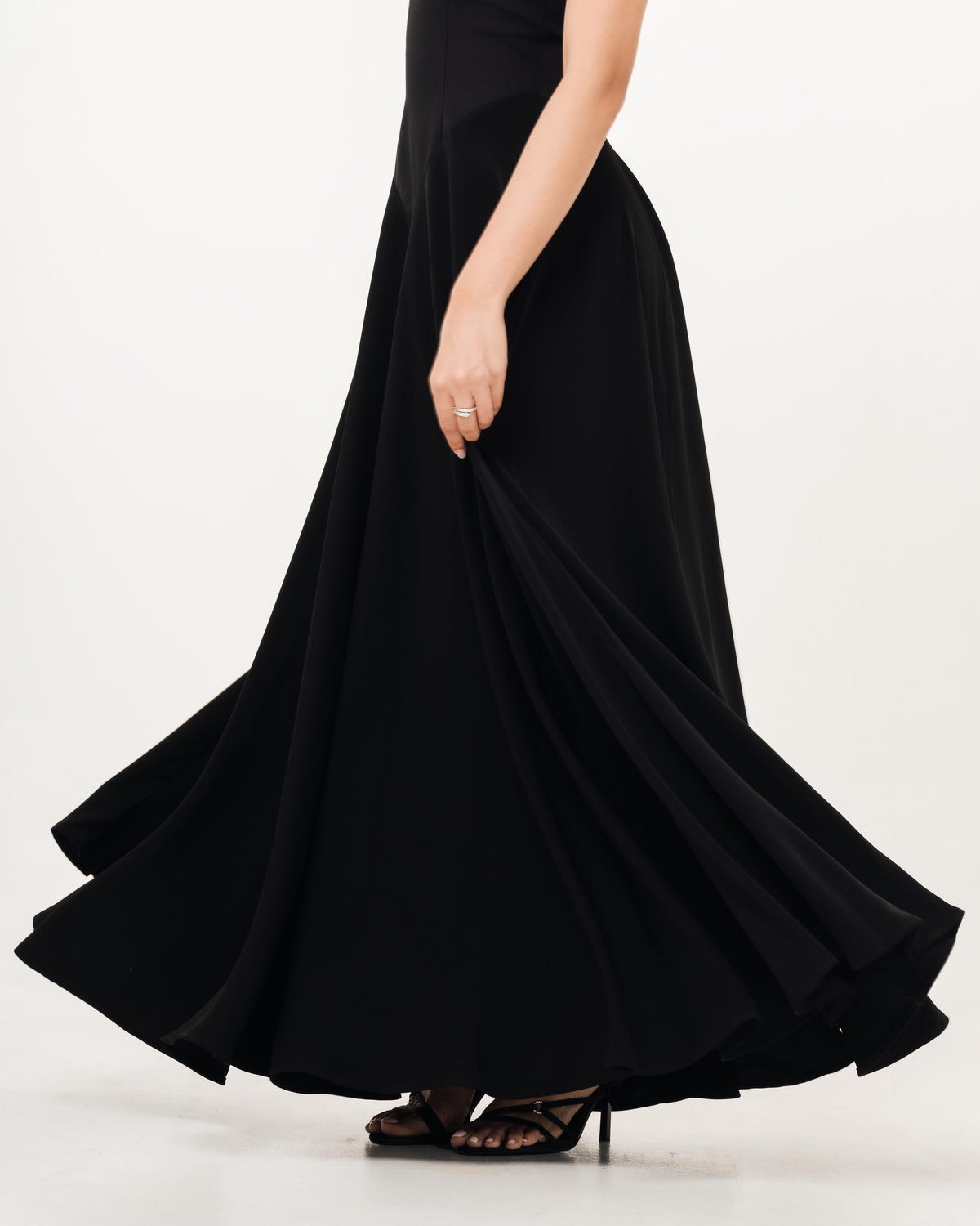 Fleur Elize Aurora black flowy dress waist detail flattering black tie silhouette