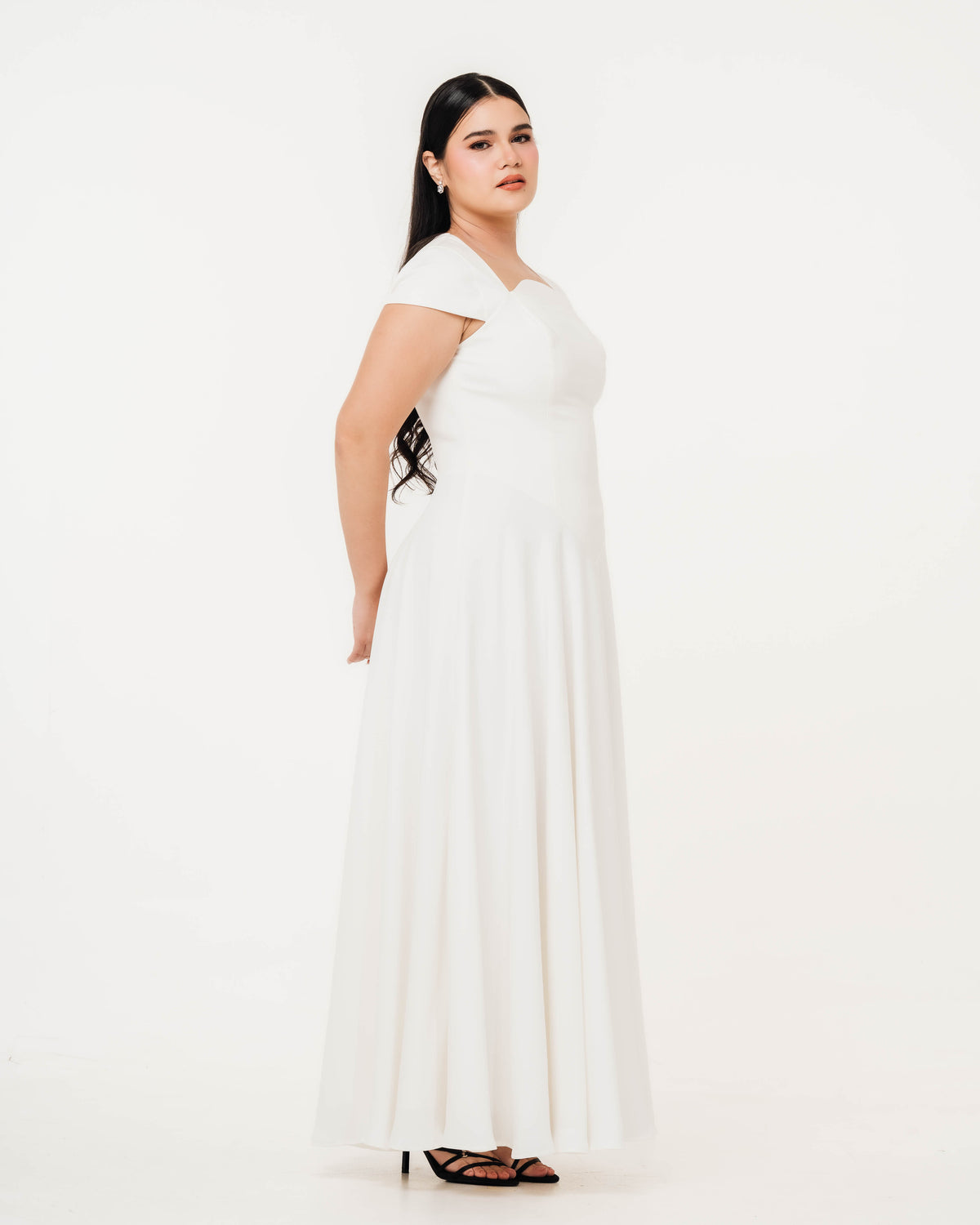 Fleur Elize Aurora ivory maxi dress side profile sleek rehearsal dinner sophistication