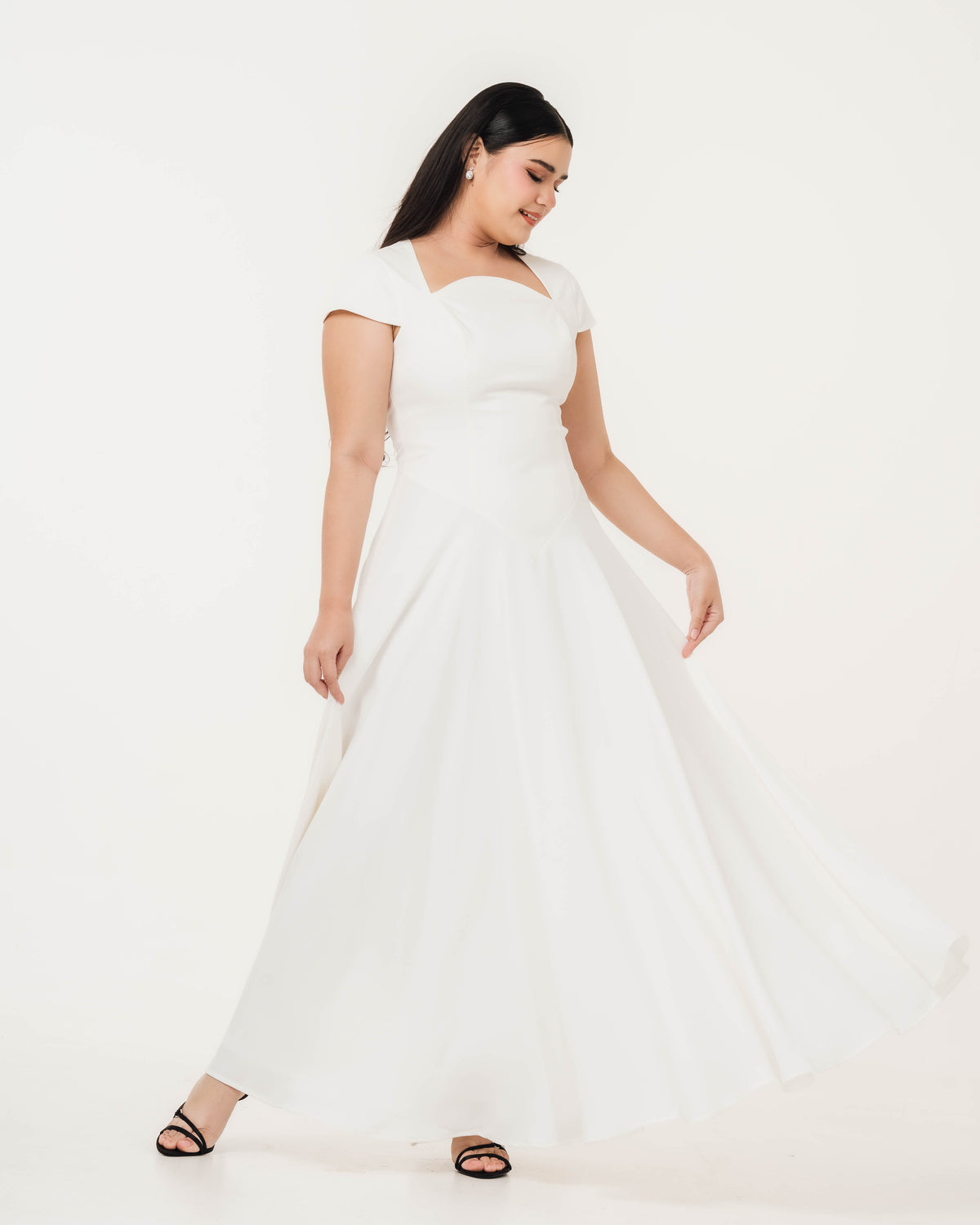 Fleur Elize Aurora ivory capsleeve flowy maxi dress front view elegant bridal silhouette