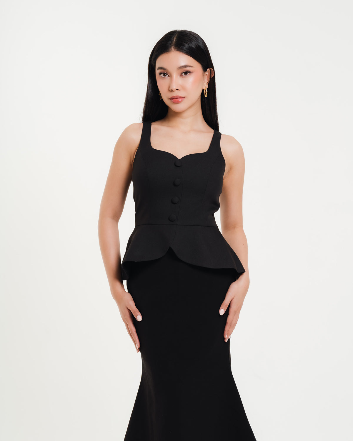 Fleur Elize Meredith black peplum top front view elegant date night silhouette