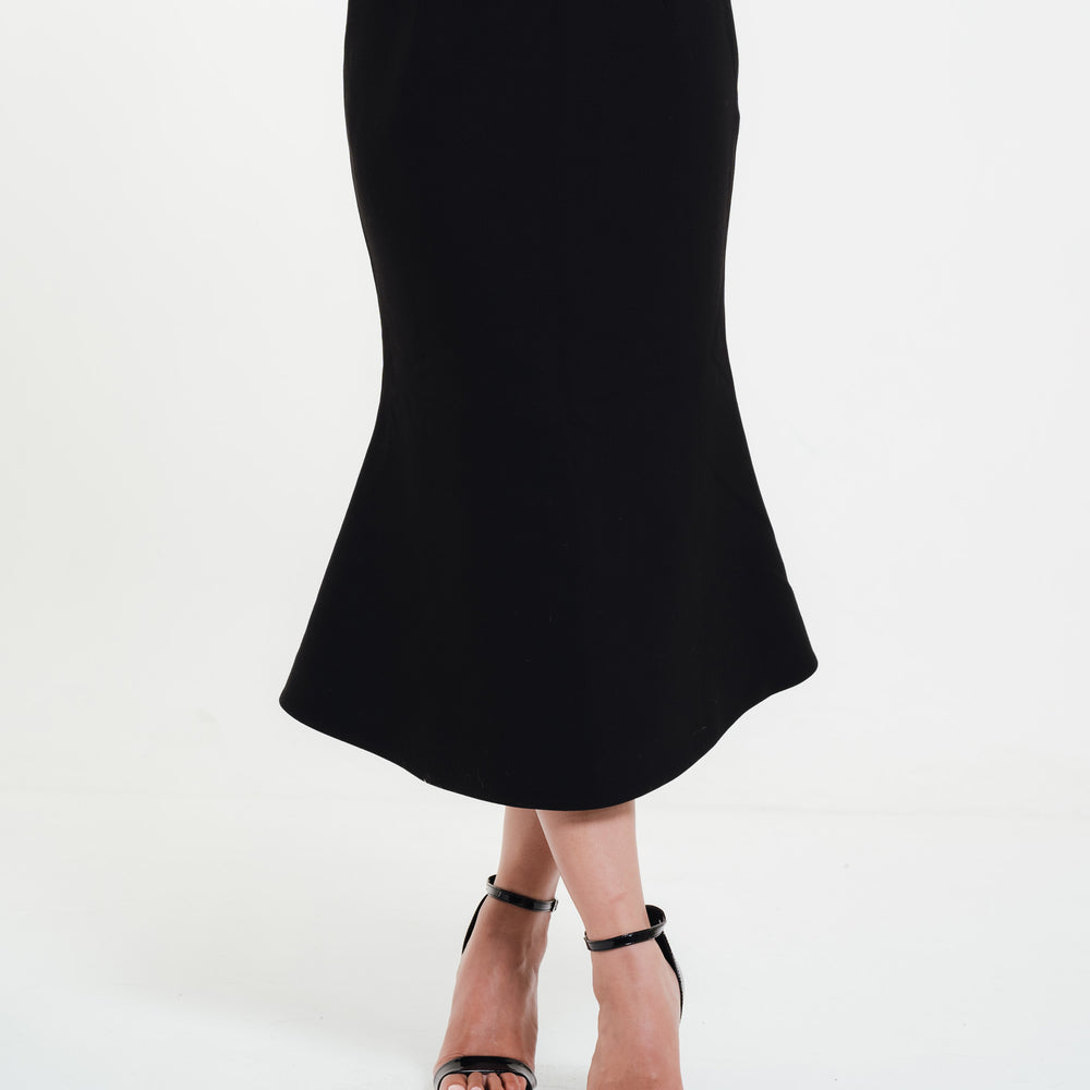 Fleur Elize black mermaid skirt — cropped front view highlighting the elegant flared hem design